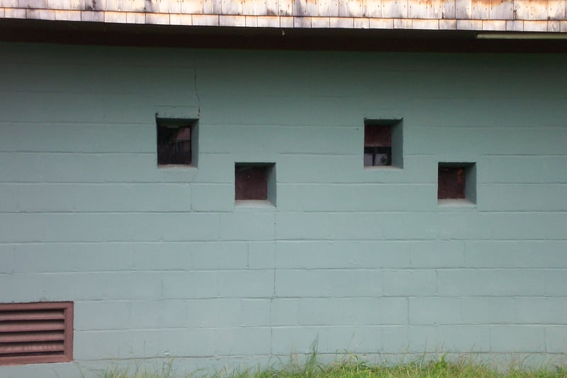 Former projection portholes on first floor.