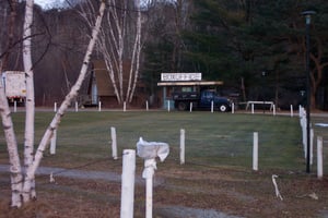 Former lot with ticket booth in background.