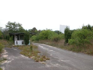 Ticket book and driveway leading to it.