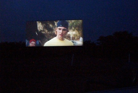 Screen is over 120 feet wide! Scope picture taken with cheap camera with no flash from about 250 feet back. Looks bright thanks to Robert Film service!