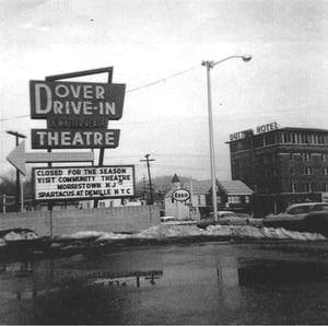 When the Dover Drive-In Movie Theater opened for the first time on September 12, 1958 it was said to be the first ever to be built above the ground level in the middle of a downtown city and the first ever to introduce a wireless speaker system.  Walter R