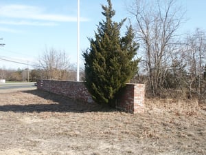 View of brick facade (covering screen tower rear supports) from street. Screen was off to the right side of the picture.