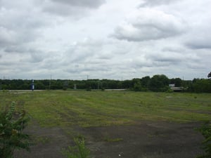 Though overgrown, you can still see the ramp outlines. You can also see the manin sign in the distance and route 73 running behind it.