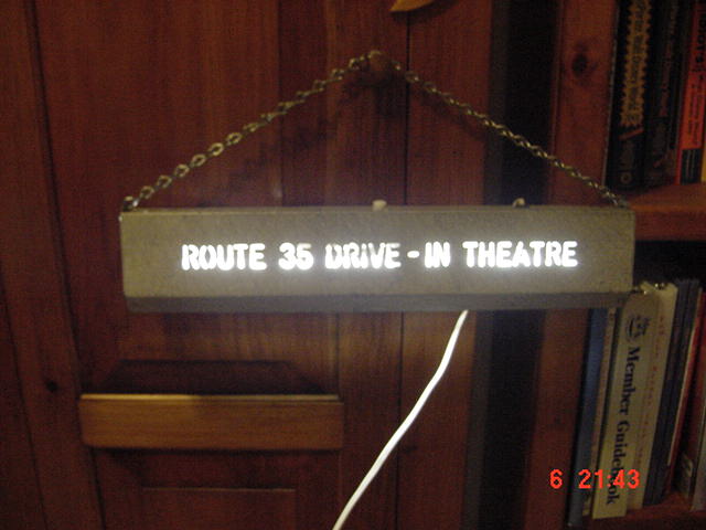 This light was mounted in the ticket booth as you drove in to the Drive In. I purchased it in 1992 at a swap meet and have never seen another. To me it is a priceless piece of history. We visited the Drive In until it closed in 1991. As you can see it st