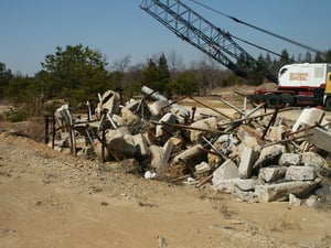 Speaker poles removed from the new WaWa parking lot built on the Southwest corner of the drive-in parking field.