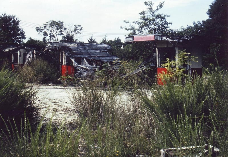 Row of 3 decaying ticket booths