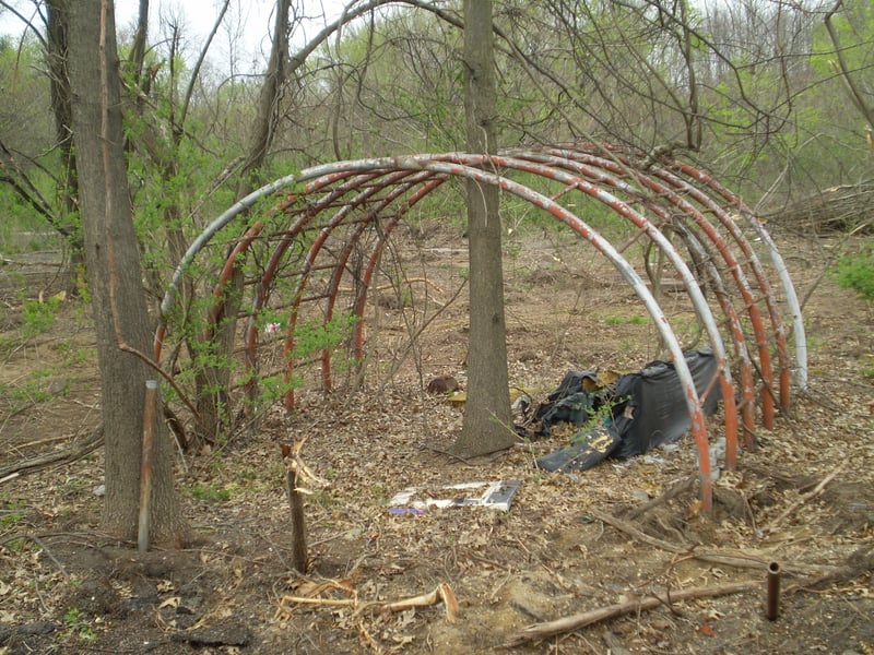 This is the monkey bars at the play area of the drive in. They were covered up by a think layer of trees. Some of the field is being cut down. i remember playing on these back in the late 1960s