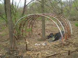 This is the monkey bars at the play area of the drive in. They were covered up by a think layer of trees. Some of the field is being cut down. i remember playing on these back in the late 1960s