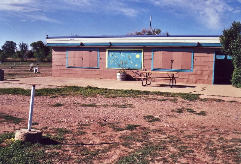 Closed front of concession building facing the screen