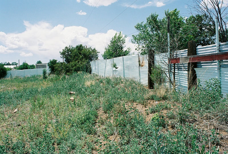 Corrugated fence- possibly from old drive-in.