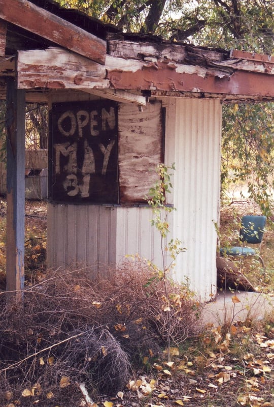 Boarded up ticket booth