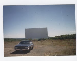 That's my Caprice police "cruisah" in front of that huge screen.