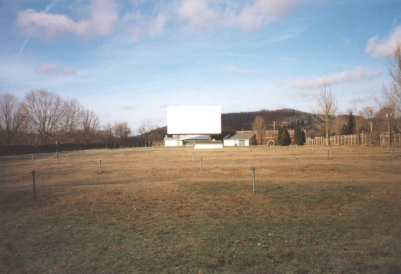 screen and field with speaker poles