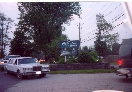 Marquee and line of cars waiting to enter.