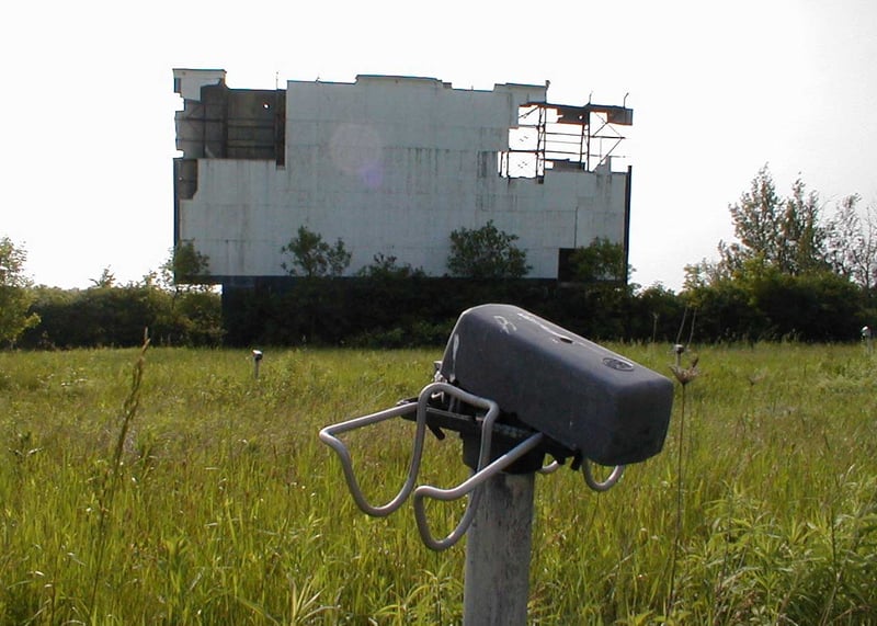 screen, with RCA speaker pole in foreground