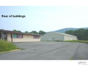 Concession stand (with newer storage building) as displayed on Ebay 8/02