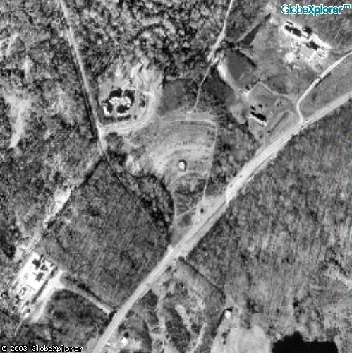 The theater was on North Road and Chapel Lane. The screen is now gone but the attached aerial clearly shows what is was. The marque is still standing and advertises services at a near-by church.
