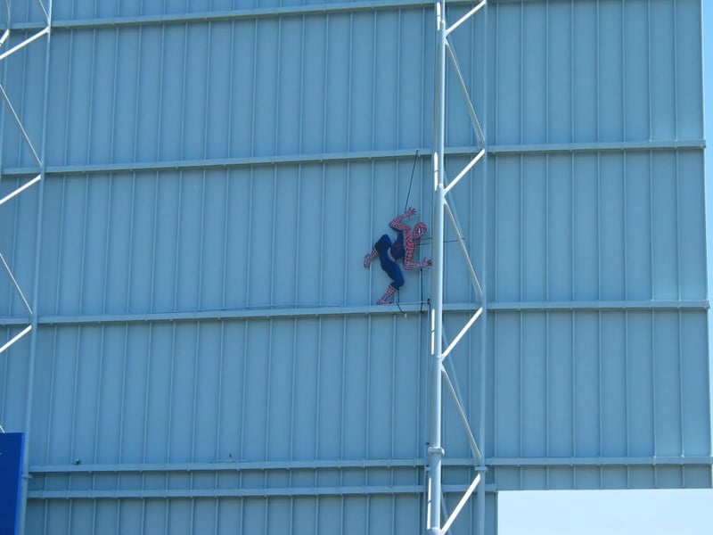 Spider-Man hanging out at the drive-in.