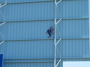 Spider-Man hanging out at the drive-in.
