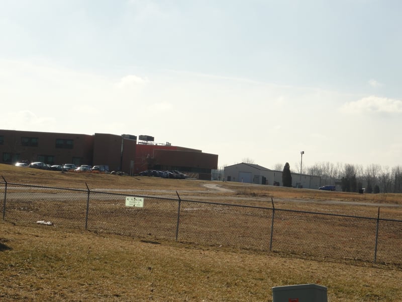 former entrance-now empty field next to State Fire Marshall