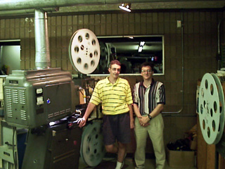 projection booth with father and son projectionists.