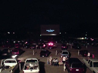 field and screen at night.