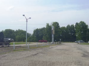 This is looking towards RT28 from in front of the concession stand, the lot surprisingly looks the same and is pretty much laid out the same as when the drive in was open.  The ramping has been smoothed over and the poles for the speakers are gone, but th
