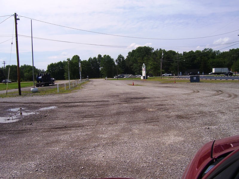 This is the old exit road out of HI-WAY 28 Drive-In, looking torward the main road. To the right of the exit road is a sign of the businesses that are there now...this is just about where the marquee sin for the old drive-in was, give or take a few extra
