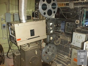 Kingman Drive-In, Delaware Ohio
GTOAA club meet event 7/7/2000
Sneaking around #3 the left projector with the movie reel Gone In 60 Seconds ready to run.