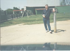 Steve Osbourne next to the playground. Note that oversized speaker pole and the standing water at the base of the photo. Thanks to Steve!