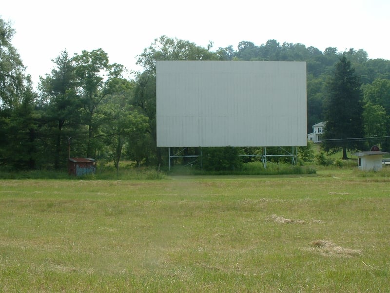 Shot of screen, ticket booth, and small electrical shed, taken from middle of field. Another good view of the screen!
