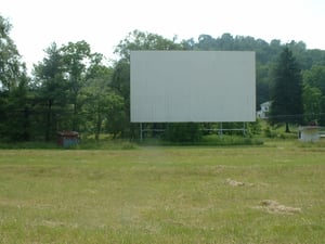 Shot of screen, ticket booth, and small electrical shed, taken from middle of field. Another good view of the screen!