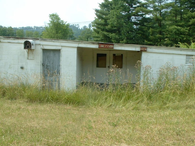 Right side view of the Snack Bar, with mens restrooms, consessions, and in the upper left hand corner, is that a transmitter to the old speakers?