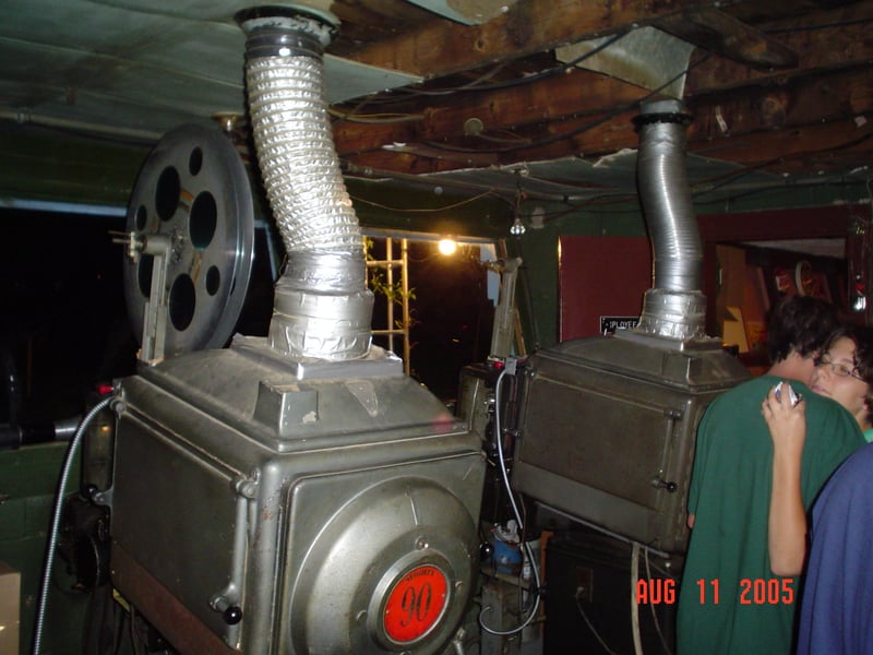 Projectionist Jamie Reding gets a hug prior to showtime.