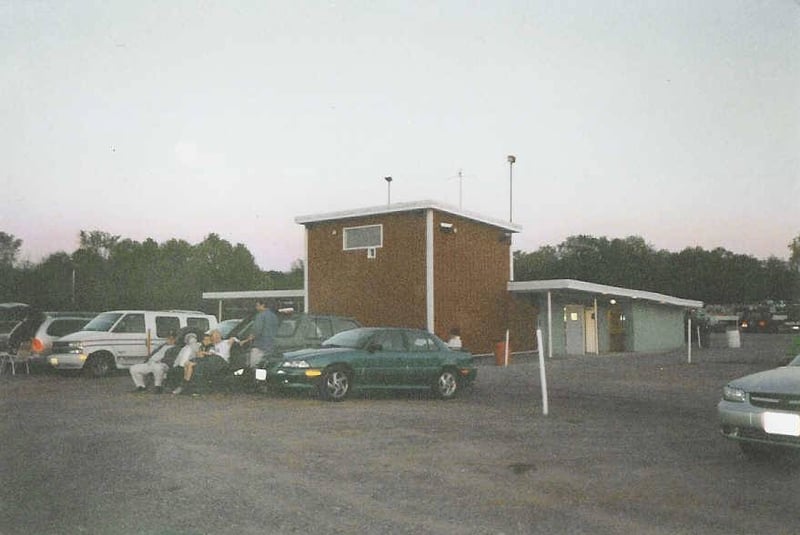 This is the concession/projection building with an upstairs projection room which I believe they built after adding a second screen, replacing the old downstairs projection room. They run off platters.