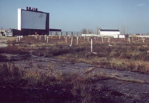 Field. The small building in front of the white barn is the projection booth