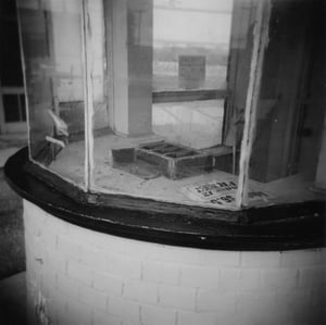 Miles Drive-In ticket booth, taken with a Holga 120 medium format plastic camera.