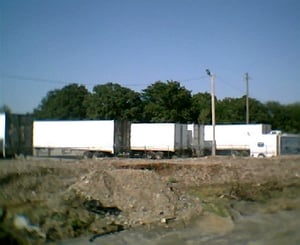 light pole in back of lot (used cheap digital camera so couldn't zoom on it better.)Its the pole behind the other one.