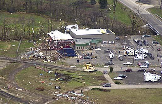 Aftermath of twister through Van Wert, OH. Note twisted screentower supports and box office and ramps...