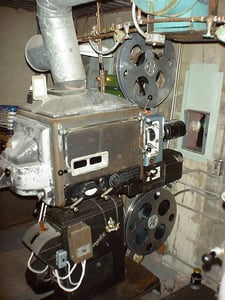 #1 Projector in operation. Cinmascope lens mounted. 6000' reel.