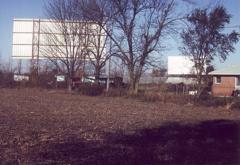 Standing  outside behind screen no. 2 with main screen in the distance