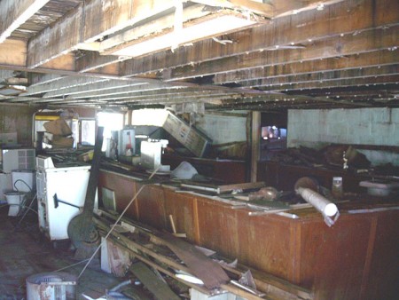 Inside the snackbar. All the fixtures are still there, soda fountains, popcorn machine, you name it, it's still there. Amazing! A calender in the projection booth (on the front of the snackbar) is dated 1983, so I assume the Skyline closed the end of t