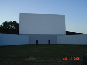 The screen is made of slate and has a storage area below it.