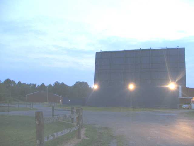 Road side of screen tower at night.
