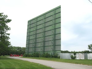 BACK OF SCREEN 1. ELABORATE STEEL STRUCTURE. VERY TALL.