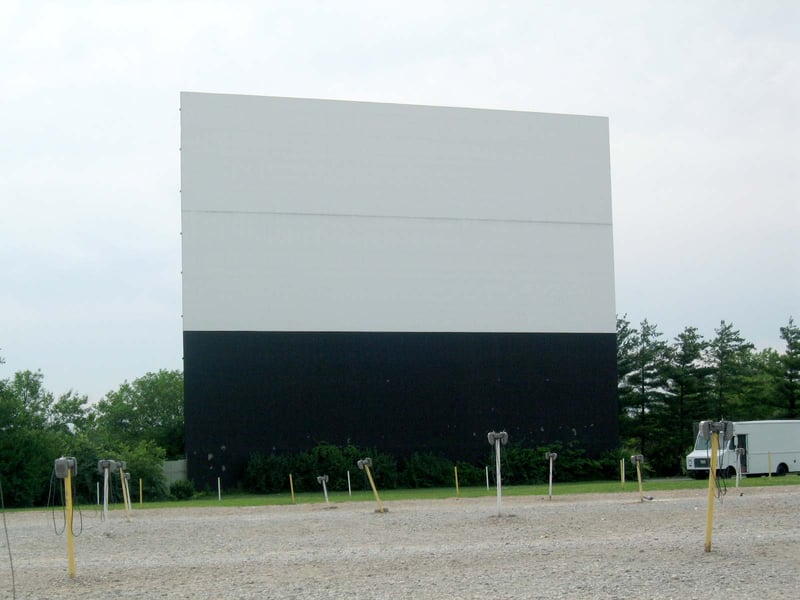 FRONT OF SCREEN ONE. NOTICE THE HEIGHT BY COMPARING IT TO THE TRUCK.