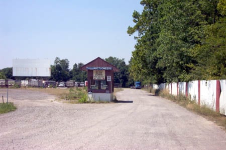 Ticket booth and entrance with the screen in the background.