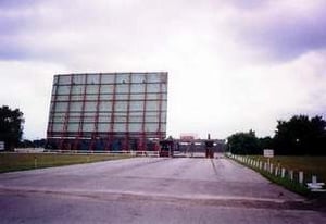 Sundance Kid Drive-In screen and original entrance and ticket booths