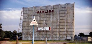 Entrance and screen tower from the Roadway Express Roadside America 2000 Calendar.
