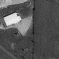 aerial view taken 1996. You can still see some of the parking humps behind the building.